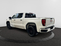 This 2025 GMC Sierra 1500 in Summit White is equipped with 4WD and Turbocharged Gas I4 2.7L/166 engi... (image 2)