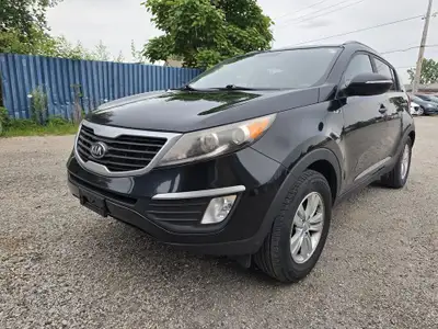 The Kia Sportage is a sporty crossover utility vehicle, conveniently sized and well-executed in almo...
