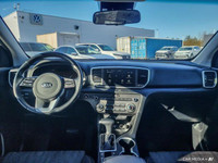 This Kia Sportage boasts a Regular Unleaded I-4 2.4 L/144 engine powering this Automatic transmissio... (image 9)