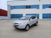 Drive with confidence in this 2011 Hyundai Tucson! With its spacious interior, smooth handling, and... (image 2)
