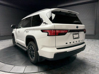 The elegance of White paired with a stately Black interior, the 2024 Toyota Sequoia TRD Off-Road awa... (image 5)