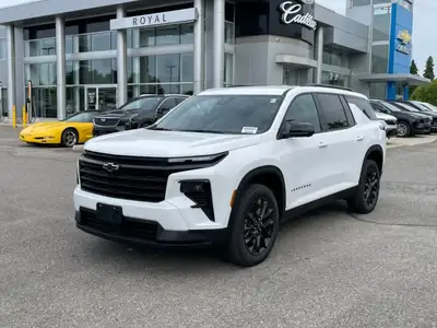 The 2025 Chevrolet Traverse LT in a pristine white exterior with AWD drivetrain is designed to handl...