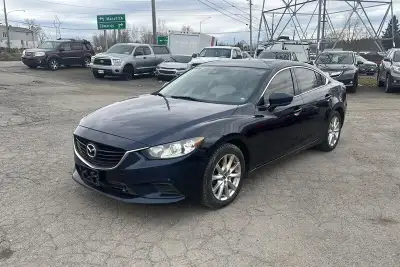 Behold the magnificent 2017 Mazda 6 GT, a sleek chariot powered by the mighty SKYACTIV-G 2.5L I4 eng...