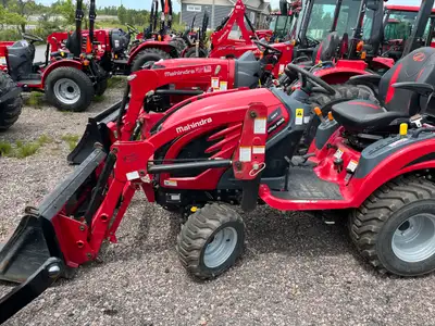Excellent condition Mahindra eMax20S HST with loader and backhoe. Low hours on tractor.