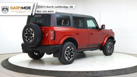 Experience the power and style of the red 2023 Ford Bronco Outer Banks 4 Door Advanced 4x4, boasting... (image 4)