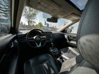 Stock#: 260013AThe 2018 Nissan Rogue SL is a practical and comfortable compact SUV, well-suited for... (image 6)