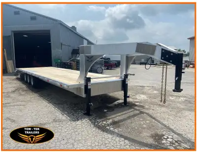 For sale is a 2024 -Tow Tekl 32, (28' + 4' Beaver tail) tailer with heavy-duty hideaway ramps. Compa...