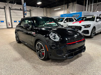 Enjoy a luxurious open-air joyride with our 2020 MINI Cooper Convertible John Cooper Works presented... (image 6)