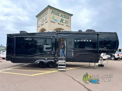 Keystone Cougar fifth wheel 316RLS highlights: Dual-Sink Vanity 400 Watt Solar System with Lithium B...