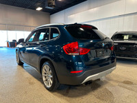 Our outstanding Blue 2015 BMW X1 xDrive35i offers fun driving dynamics great versatility and awesome... (image 2)