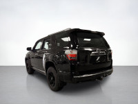 Meet our used 2014 Toyota 4Runner SR5 Limited 4WD shown in Attitude Black. This SUV is powered by a... (image 2)