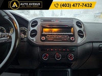 THIS 2014 VOLKSWAGEN TIGUAN TRENDLINE COMBINES COMFORT AND VERSATILITY IN A COMPACT SUV. EQUIPPED WI... (image 9)