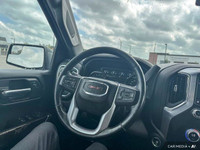 The 2022 GMC Sierra combines rugged capability with modern features. Highlights include a spacious i... (image 9)