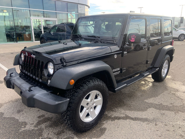 2017 Jeep Wrangler Unlimited Sport in Cars & Trucks in London