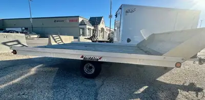 Get ready for winter now, with this recent trade in. This aluminum 8.5x10 Triton snowmobile trailer...