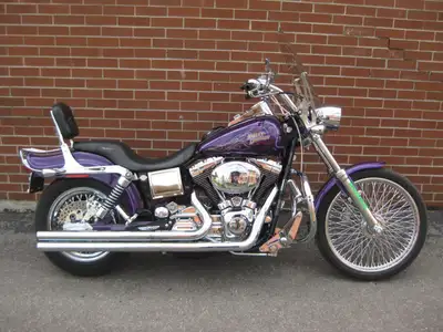 Welcome New Riders! Financing Options Available! Nothing stock about this Dyna Wide Glide with the e...