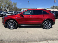 **WE WILL BEAT ANY DEALER IN THE CITY** Recent Arrival! Radiant Red Tintcoat 2024 Cadillac XT4 Sport... (image 1)