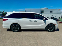 The 2024 Honda Odyssey Touring is a premium minivan that seamlessly blends family-friendly versatili... (image 3)