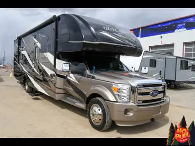 You deserve to know this 2014 Outlaw 35SG has just arrived on our lot! This unit is $149,999 Full ph...