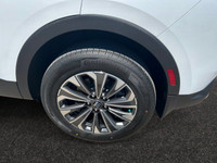 This 2025 Buick Envision in Iridescent White Tricoat is equipped with AWD and Turbocharged Gas I4 2.... (image 8)