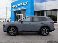 This 2024 Nissan Rogue SL boasts a stunning Boulder Grey Pearl exterior and a sophisticated Graphite... (image 2)