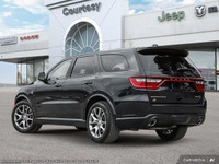 This Dodge Durango has a durable Intercooled Supercharger Premium Unleaded V-8 6.2 L/376 engine powe... (image 4)