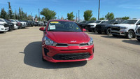 This Kia Rio is equipped with: Cloth, 6 Speakers, Cloth Seat Trim, Heated front seats, Radio: AM/FM/... (image 7)