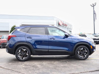Experience rugged elegance and confident performance with the 2024 Kia Seltos EX Premium AWD in stri... (image 2)