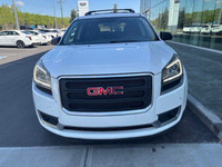 The 2016 GMC Acadia SLE is a versatile and family-friendly SUV, presented in a clean Summit White ex... (image 1)