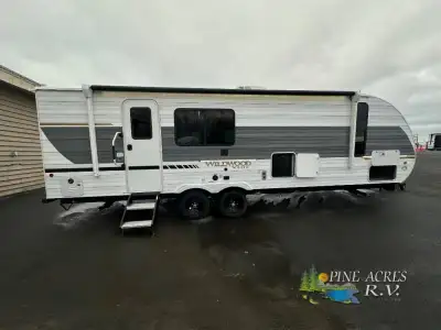 Forest River Wildwood X-Lite travel trailer 25ICE highlights: Front Private Bedroom Large Slide Out...