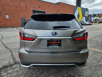 Indulge in the perfect fusion of sophistication, power, and efficiency with the 2018 Lexus RX 450hL.... (image 5)