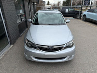This 2009 Subaru Impreza 2.5i is a perfect mix of dependability, efficiency, and all-weather capabil... (image 5)
