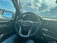 The 2023 GMC Sierra features four-wheel drive, aluminum wheels, and a locking/limited-slip different... (image 9)