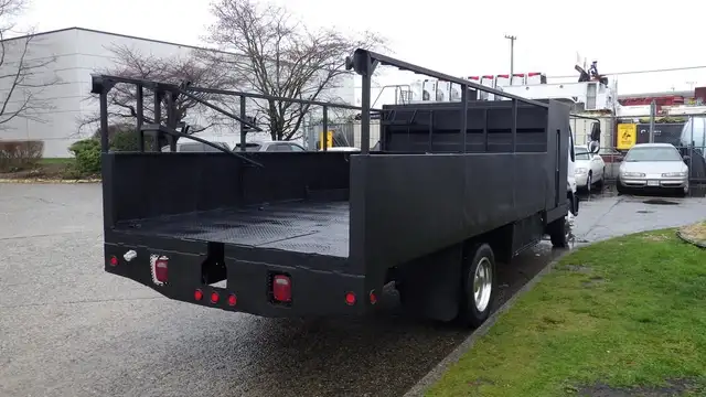 2009 international CF 600 City Star Side Dump Truck 3 Seater Die in Heavy Trucks in Richmond - Image 10