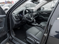 Experience the sleek and stylish 2023 Kia Seltos EX, a compact SUV perfect for navigating city stree... (image 6)