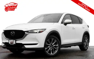 Check out this sleek 2021 Mazda CX-5 Signature AWD! With advanced features like HUD, 360 Camera, and...