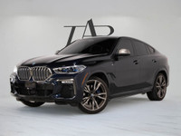 This 2020 BMW X6 M50i Coupe commands attention with aggressive styling, a powerful V8 engine, and re... (image 2)