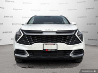 Experience the practicality and reliability of a 2023 Kia Sportage LX, boasting a sleek white exteri... (image 9)