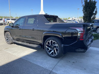 The 2024 Chevrolet Silverado EV RST in Black is a powerful and innovative electric pickup truck. Its... (image 4)