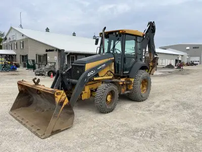 2012 John Deere 410J is powered by a 98hp John Deere diesel engine. Unit is equipped with front hydr...