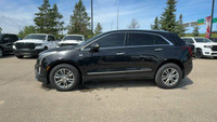 This Cadillac XT5 is equipped with: Leather Seating Surfaces w/Mini Perforated Inserts, Power moonro... (image 9)