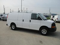 4.8 liter ,auto ,air , am/fm radio. work ready, cargo equipped with divider,ladder rack and loads of... (image 3)