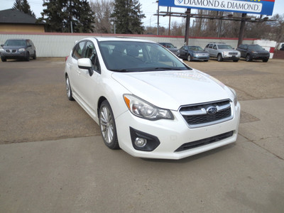 2012 Subaru Impreza 2.0i w/Touring Pkg w/Htd Seats/Bluetooth/Roo