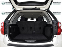 The 2014 Chevrolet Equinox LT AWD in a crisp white finish is a versatile and capable SUV designed to... (image 7)