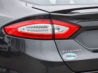 The 2015 Ford Fusion is a sleek, midsize sedan that offers a perfect blend of style, efficiency, and... (image 9)