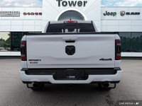 Unleash the power of the 2023 Ram 1500 Sport Crew Cab. This head-turning Bright White truck boasts a... (image 5)