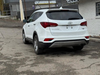 The 2018 Hyundai Santa Fe Sport 2.4L SE AWD is a midsize crossover SUV that combines practicality wi... (image 5)