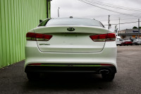 This 2016 Kia Optima is for sale today. This sedan has 102,362 kms. It's white in colour and is comp... (image 4)