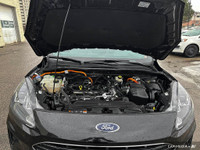 WAS: $33879 NOW: $24498 plus taxes and licensing feesDiscover the 2022 Ford Escape SE Hybrid: A Perf... (image 8)
