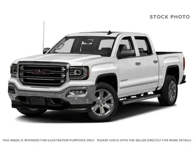 Powerful presence meets sophisticated comfort in the 2018 GMC Sierra 1500 SLT, graced with a Dark Sl...